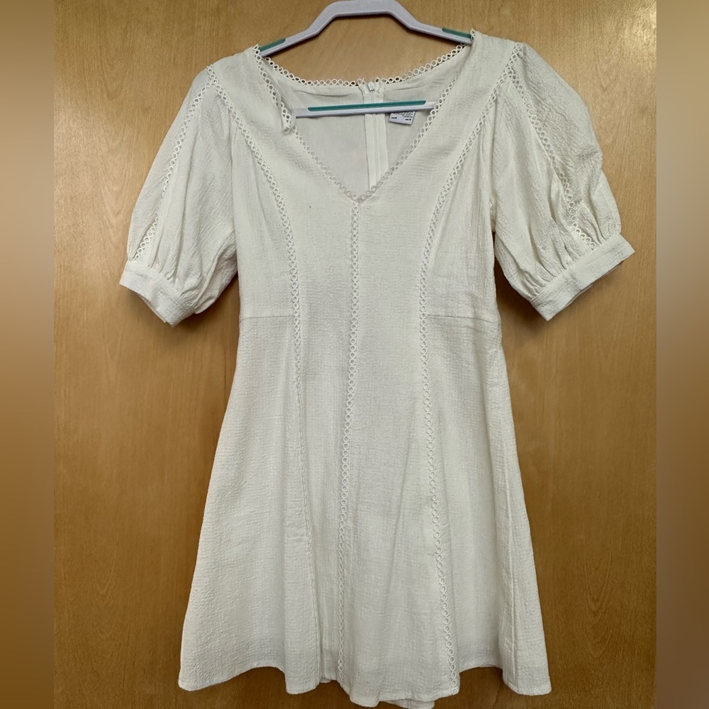 White plunge neck mini dress